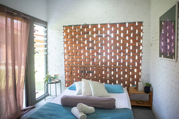 Bed with back drop