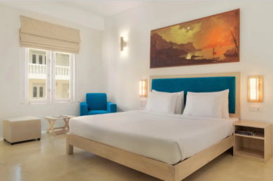 Bed with Painting over head